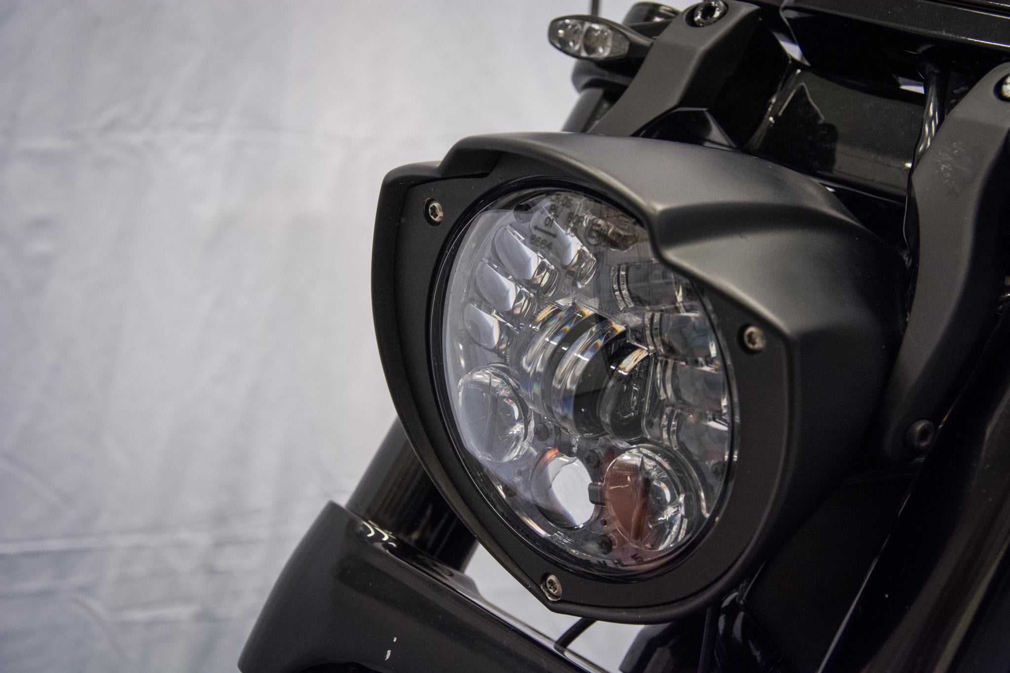 Side mounted custom V-Rod Muscle headlight cover